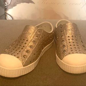 Size 6 Toddler Native Shoes ( gold/bronze )